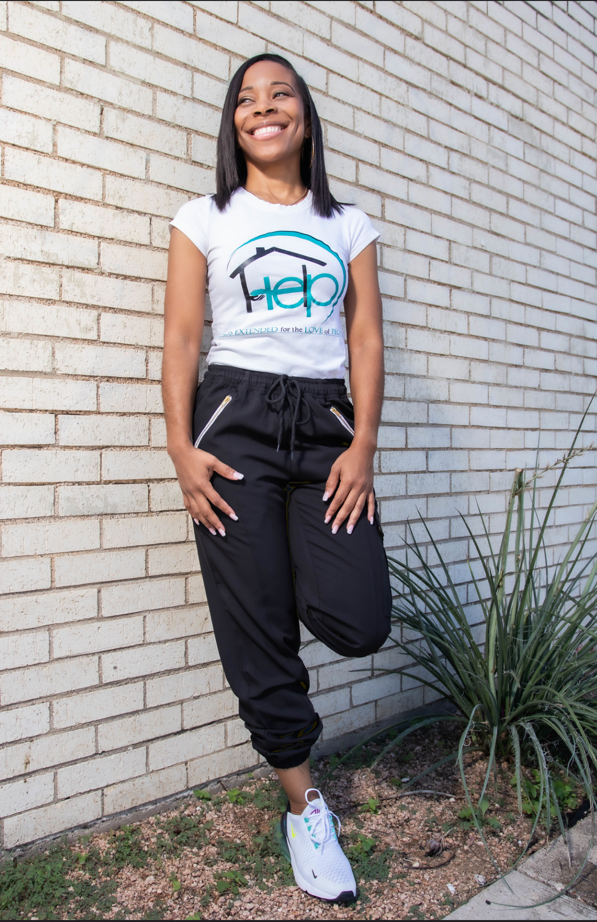 Starlett Smith wearing a H.E.L.P. T-shirt